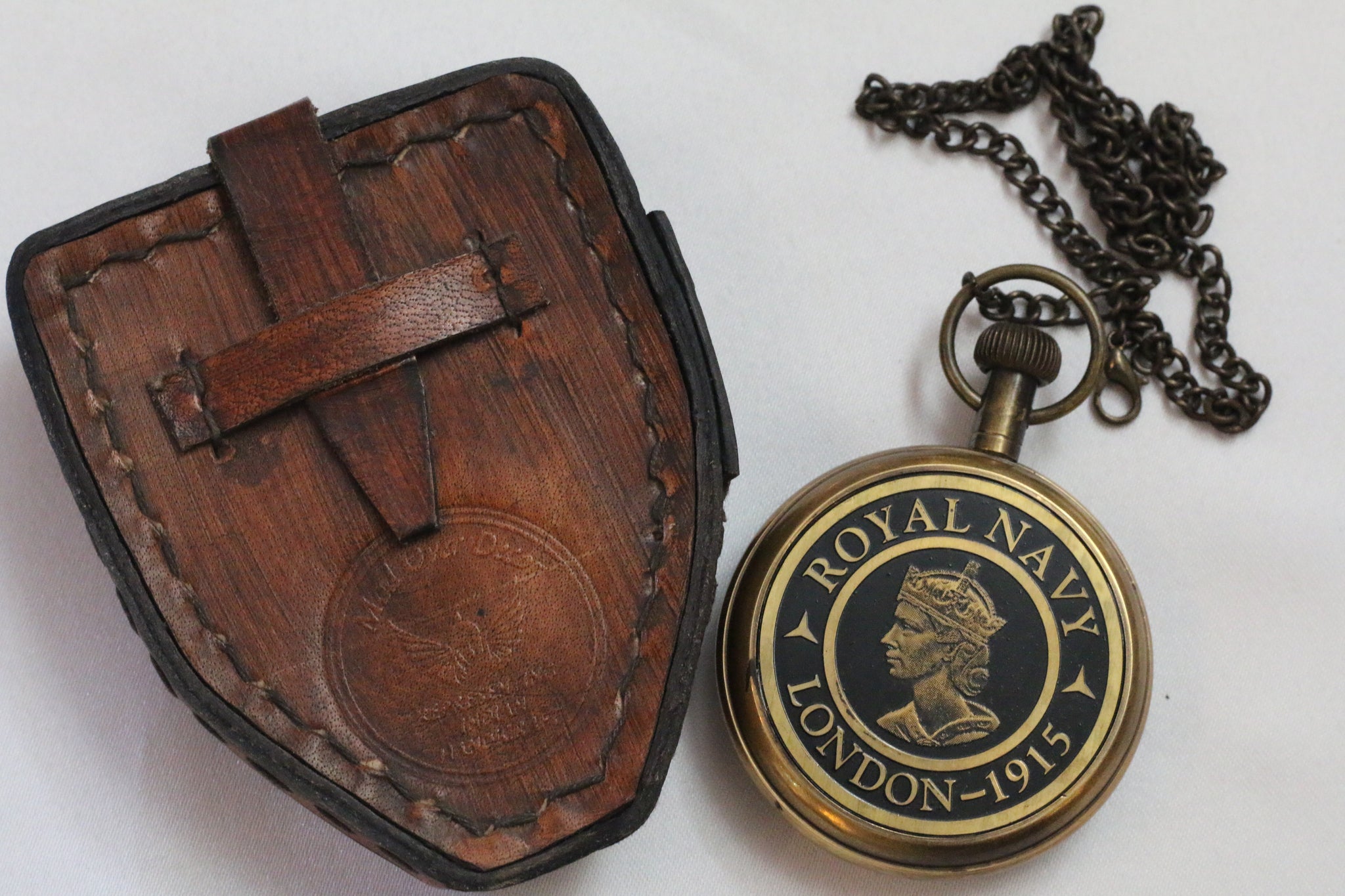 Royal navy antique style brass pocket watch with leather case Bygone Days Eclectic Emporium